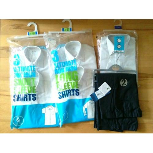 Brand new white shirts and trousers, school uniform