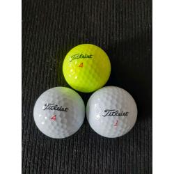 25 Titleist DT Trusoft golf balls.