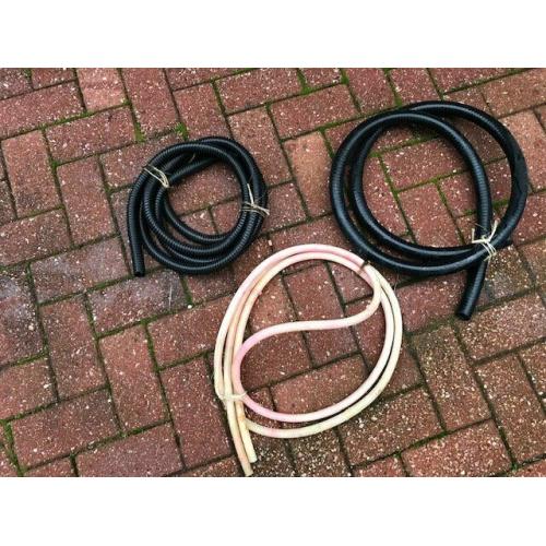 Three lengths of plastic tubing