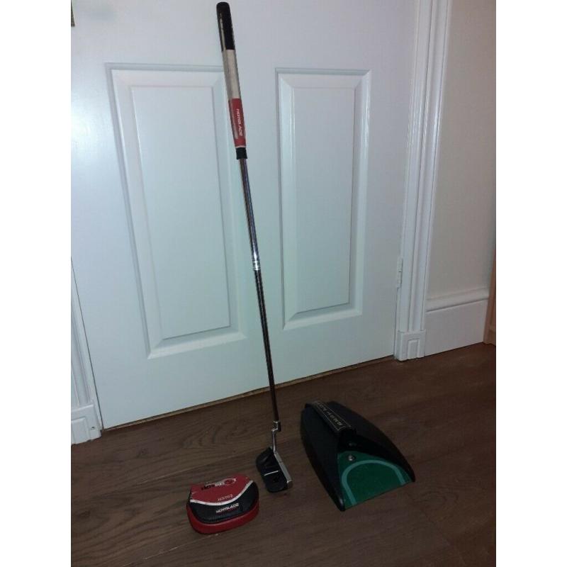 Golf putter and putting machine