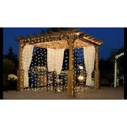 Warm white n multicoloured curtain lights